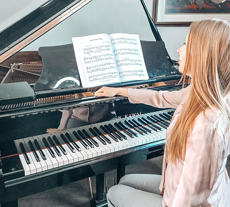 At the piano