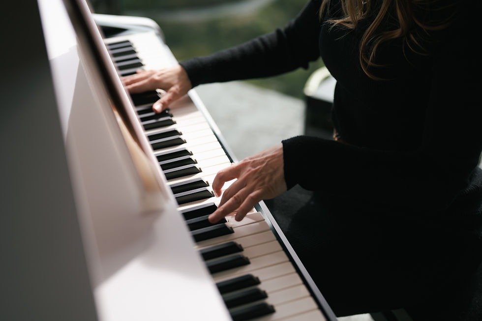 Close-up view of keys being played on a grand piano, showcasing the artistry involved in performance.