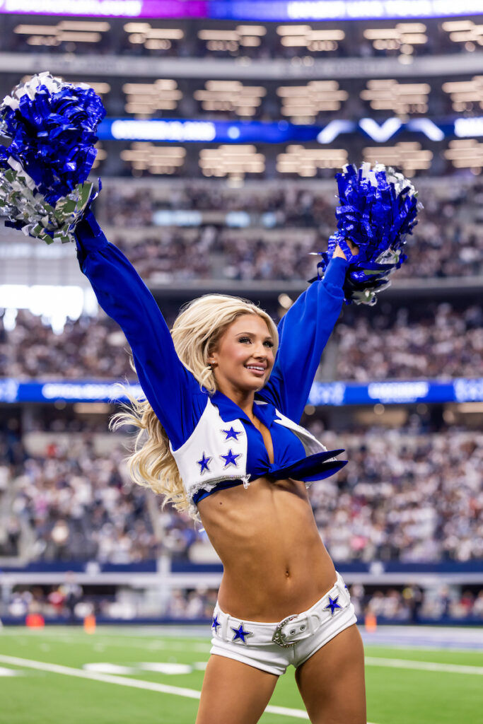Dallas Cowboys Cheerleader cheering during an NFL game