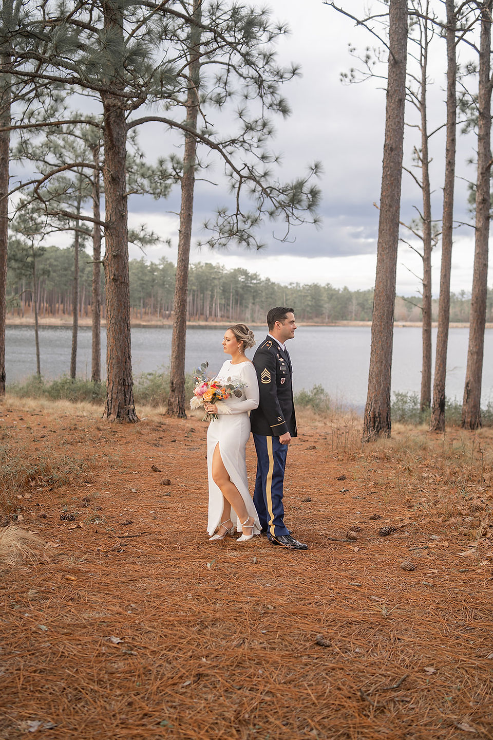 Bride and grooms back to back at their Elopement on Fort bragg