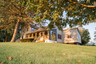 the front outside view of an airbnb wedding venue that's located near appleton
