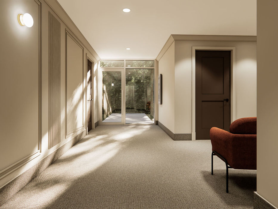 Espace commun lumineux avec accès extérieur dans l’immeuble Altitude 33 à Mirabel.