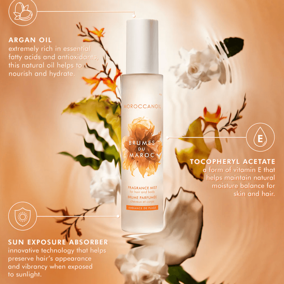 Brume parfumée Moroccanoil Brumes du Maroc pour les cheveux et le corps présentée avec des éléments floraux et des ingrédient