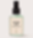 Brume apaisante After Sun Tanit à l’aloe vera dans un flacon vaporisateur givré de 60 ml avec pompe noire, présentée sur fond