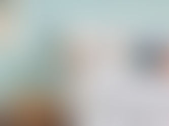 Relaxing bedroom with turquoise and coral accents