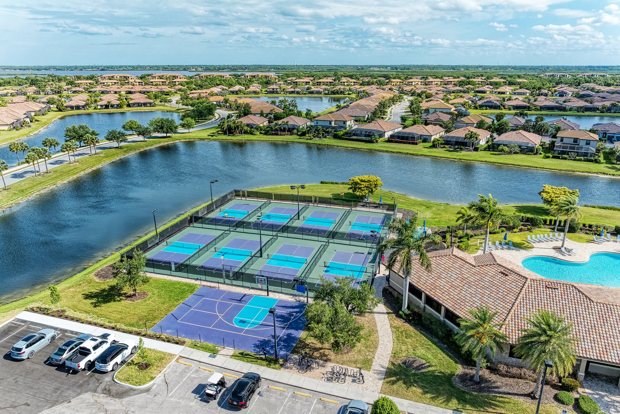 Clubhouse dining and resort pool at River Strand Golf and Country Club