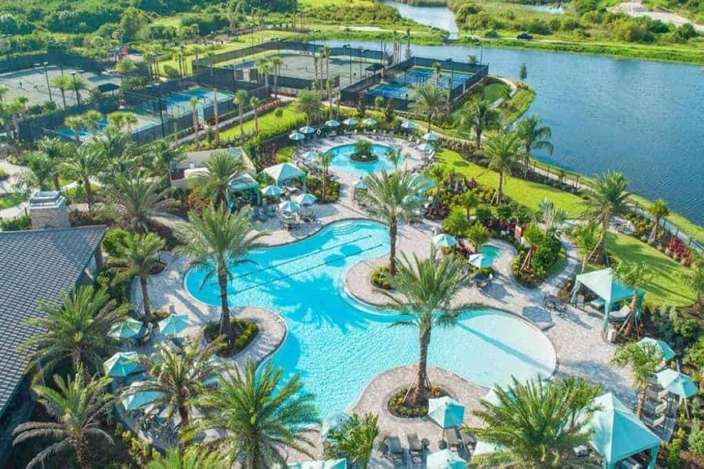 Resort-style lagoon pool and clubhouse at Esplanade by Siesta Key