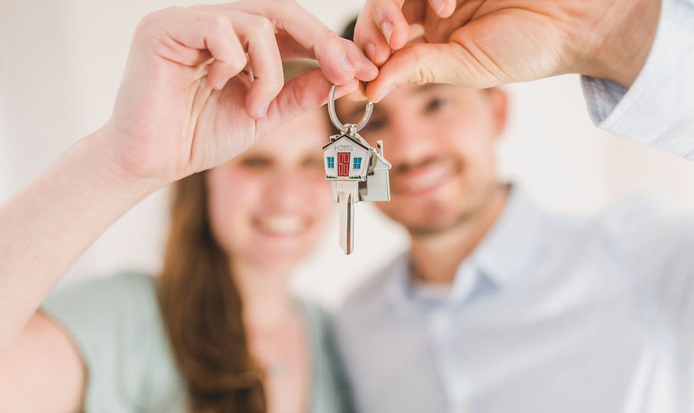 Happy couple celebrating new home purchase