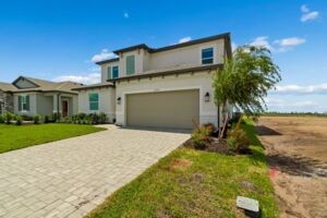 New construction model home exterior at The Reverie Parrish FL