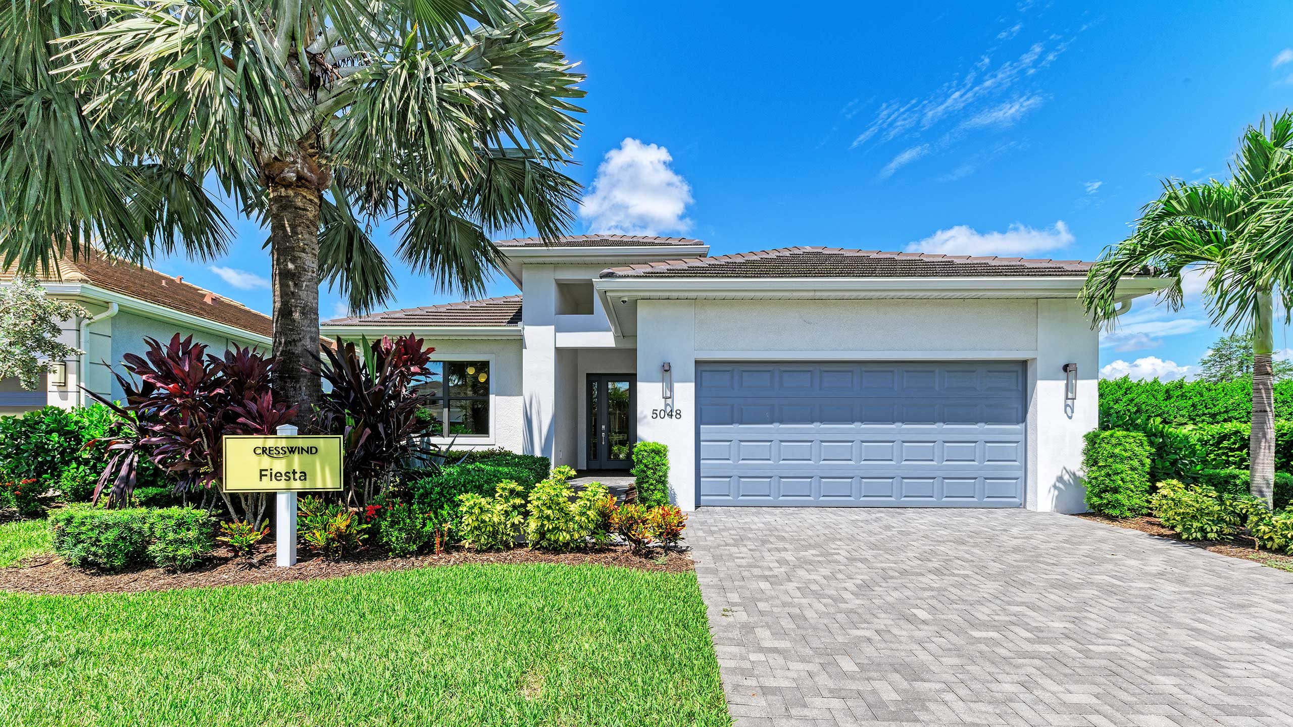 Kolter Homes model home with covered lanai at Cresswind Lakewood Ranch FL