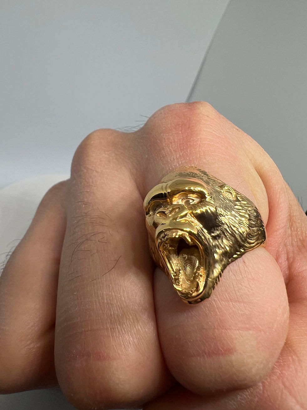 Thumbnail: 18k Yellow Gold Gorilla Ring Worn On Finger