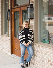 Team members at (RE) EMBELLISHED & COMPANY creating a welcoming boutique shopping experience in downtown Fayetteville, GA