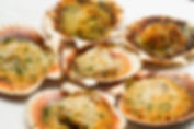 Scallops with a herb and parmesan crust.