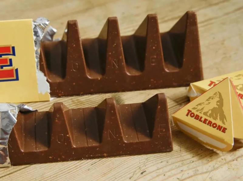 Mondelēz faced a lot of backlash in 2016 when they widened the gaps between the triangular-shaped chocolates in their Toblerone product and reduced the number of triangles. Photo: Alastair Grant/AP