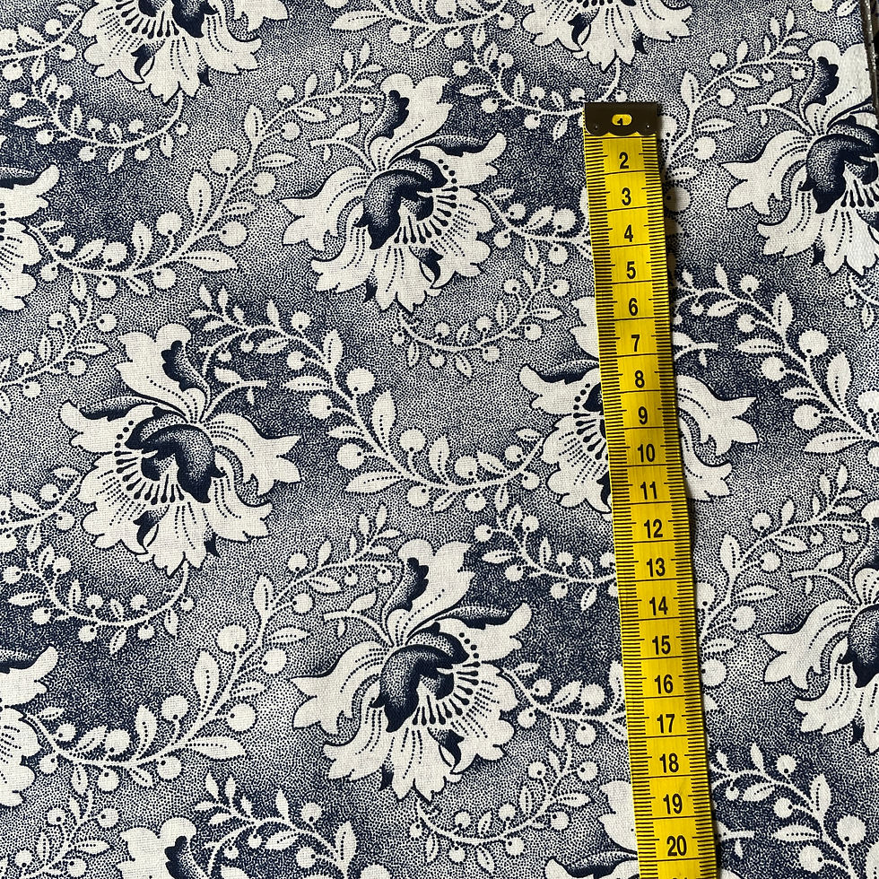 Thumbnail: White Large Flowers Shweshwe with measuring tape showing pattern size