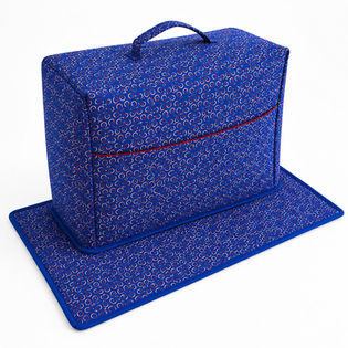 handmade Shweshwe sewing machine cover in blue loops fabric with matching mat