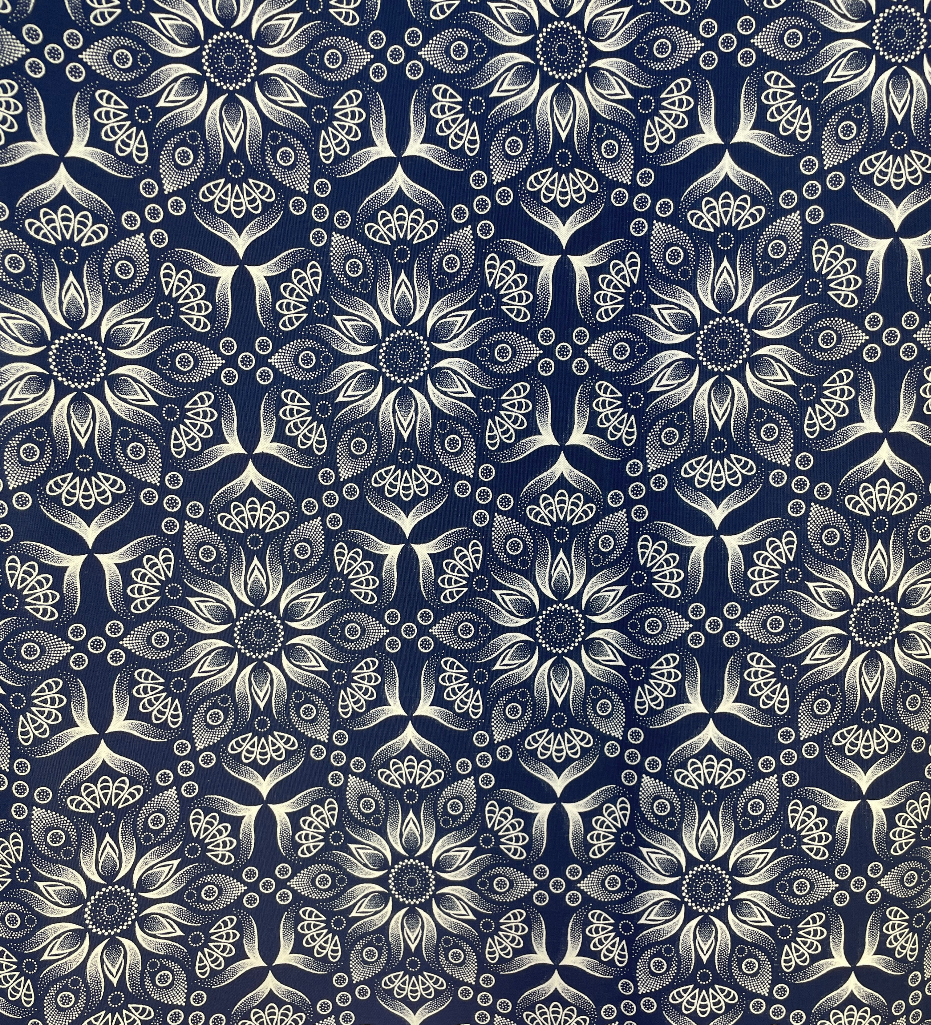 Indigo Hexagonal Flowers Three Cats Shweshwe fabric with cream floral geometric pattern