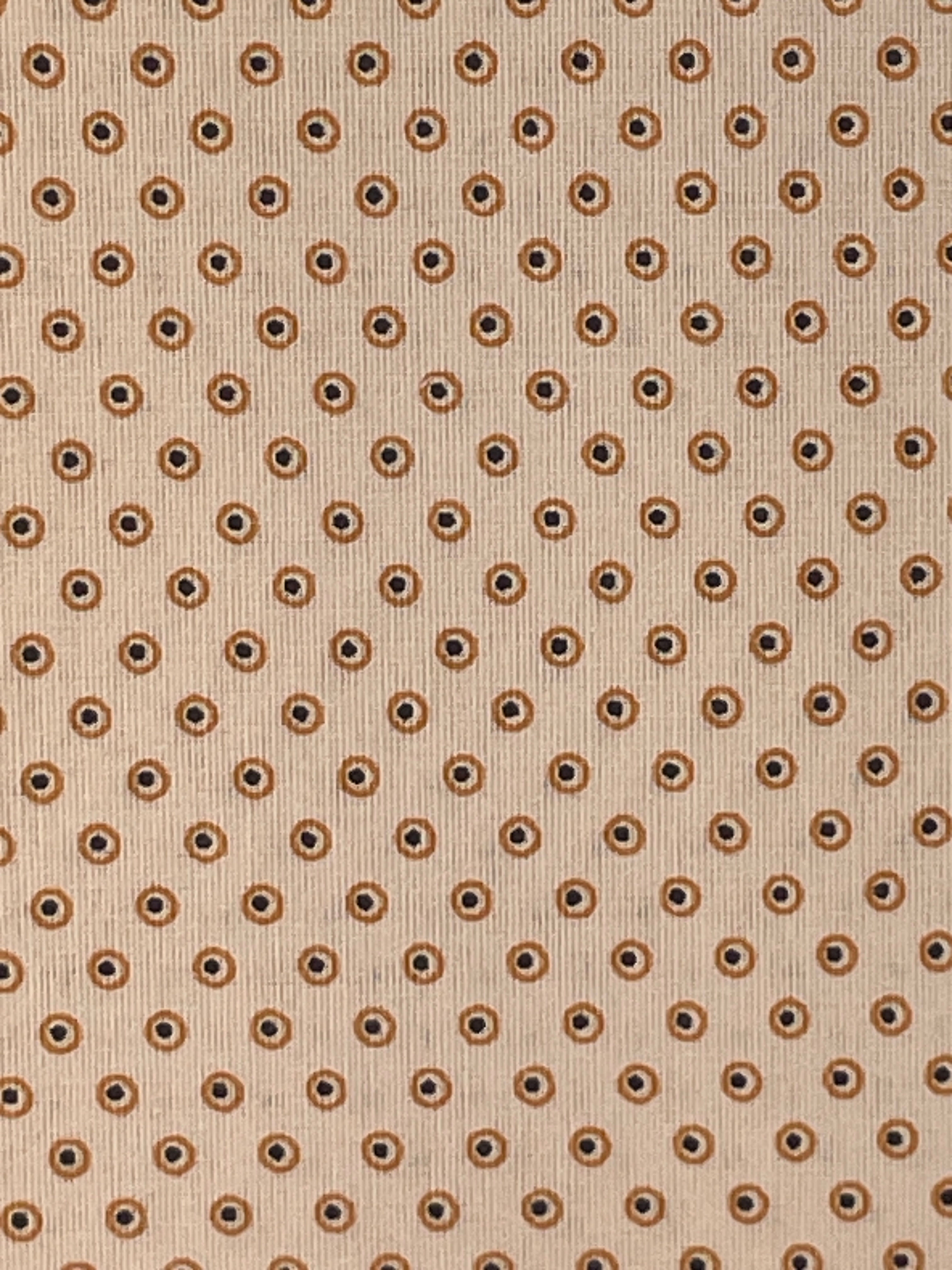 Close-up of small ochre dot motif on Beige Dots Shweshwe fabric