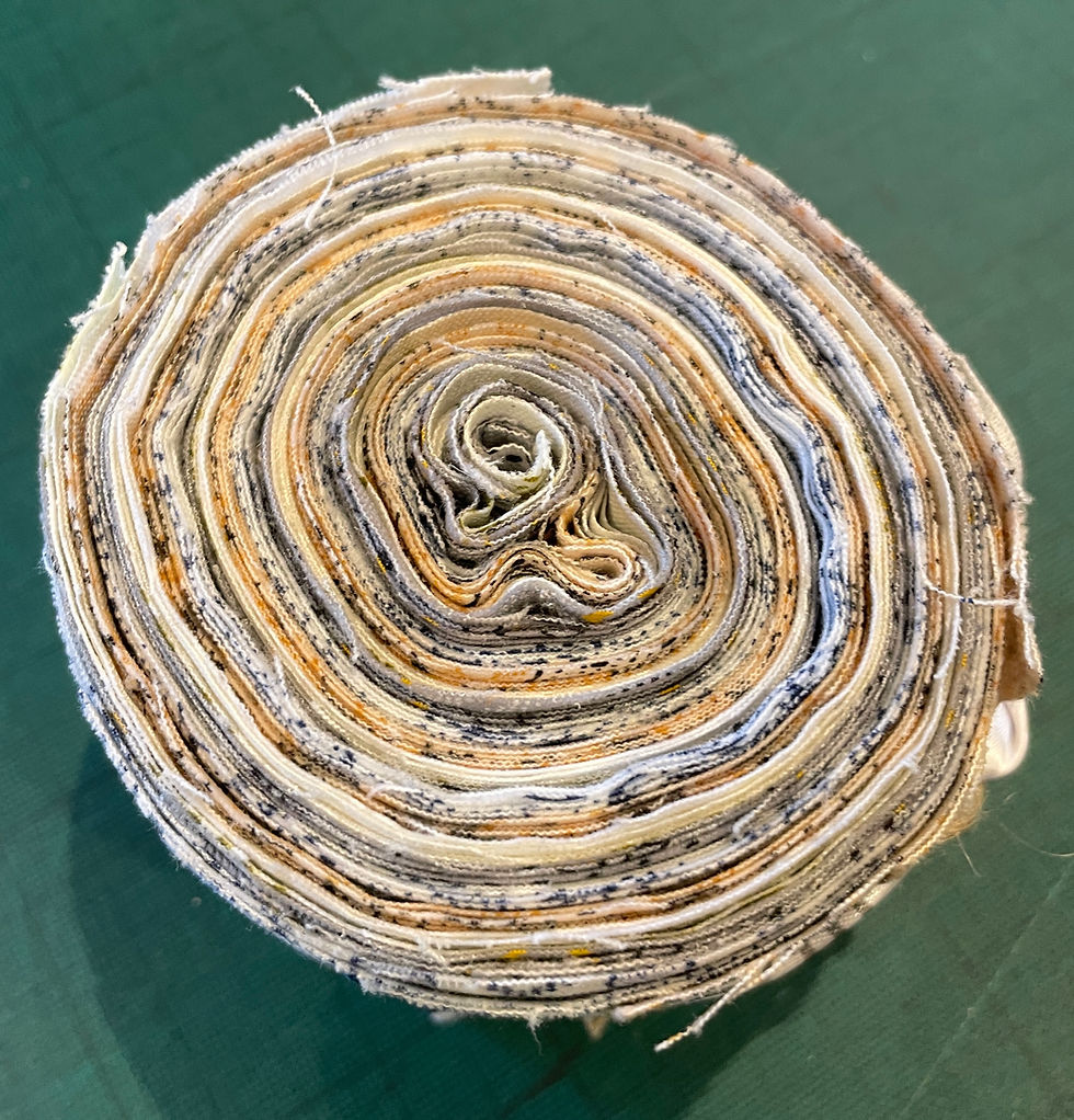 Thumbnail: rolled light shweshwe fabric strips for quilting and sewing projects