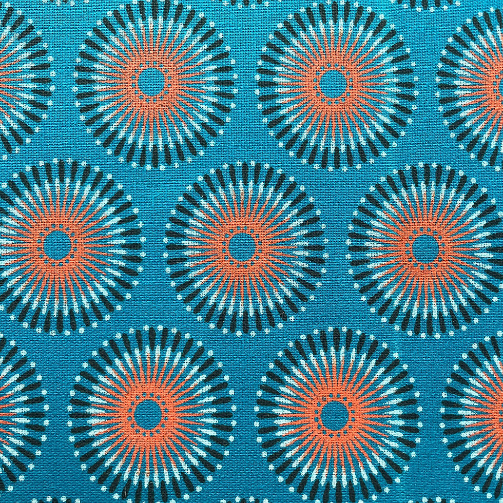 Close up of turquoise chrysanthemum Three Cats Shweshwe cotton