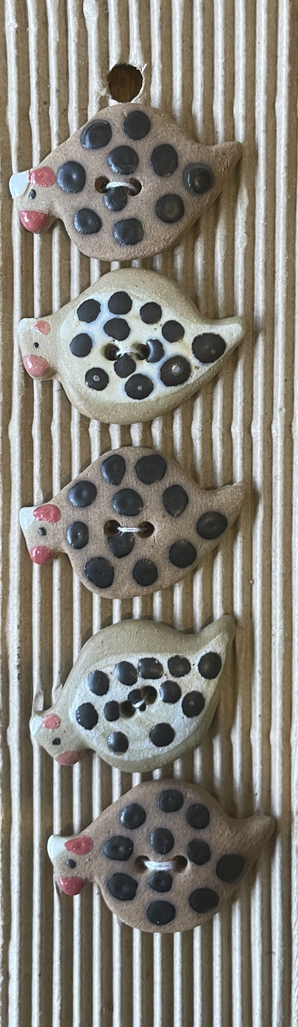 spotted guinea fowl ceramic sewing buttons close up