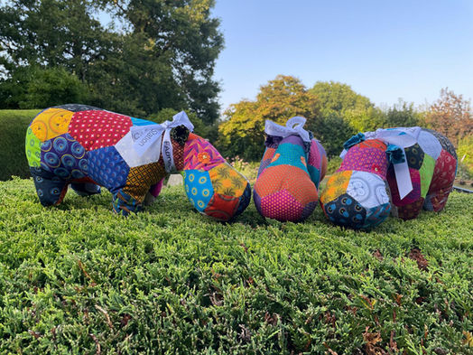 Three Toy hippos crafted with traditional Shweshwe fabrics