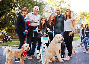 multigenerational group outside at neighborhood block party