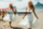 blonde women in white dress on the beach with her fans