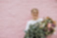 Seaholly Floral Design Shop flowers, Abigail holding as luxruy bunch of seasonal flowers
