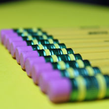 Pencils lined in a perfect row
