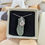 Thumbnail: sea glass necklace with silver shell in a gift box