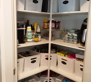 Organised pantry with plastic containers