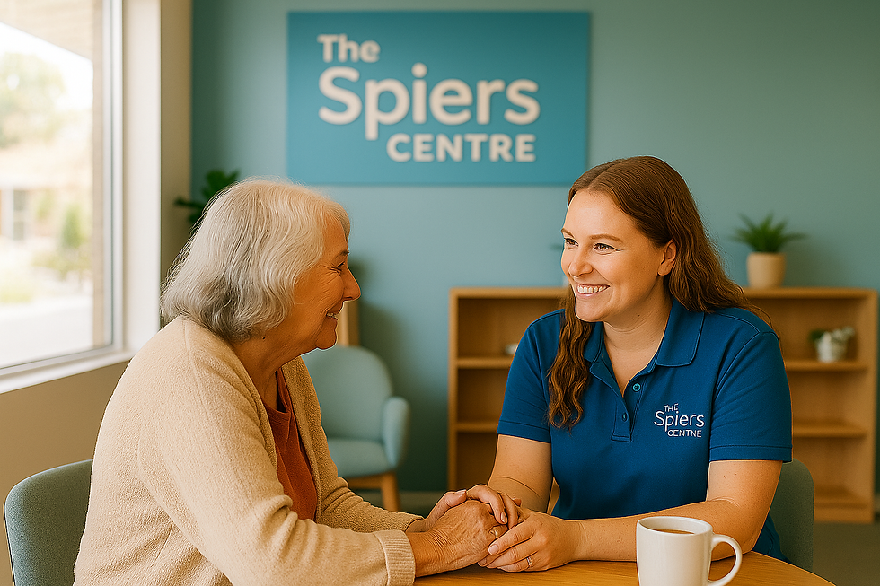 Volunteer greeting a local mother at The Spiers Centre in Perth Support group with free crèche – community support in Western Australia