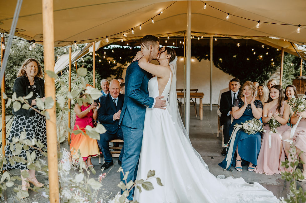 Treseren Wedding Couple marrying the rain under the stretch tent