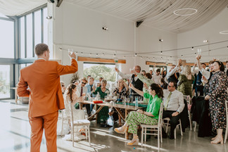 groom giving speech inside the barn at pengelly