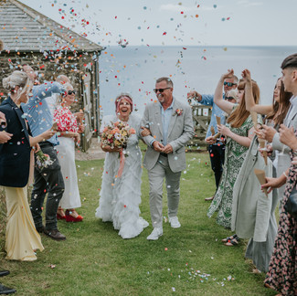 Confetti line walking up from the sea
