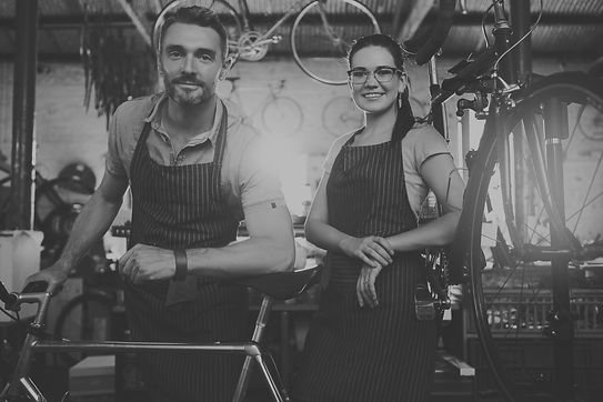 male and female bike technicians