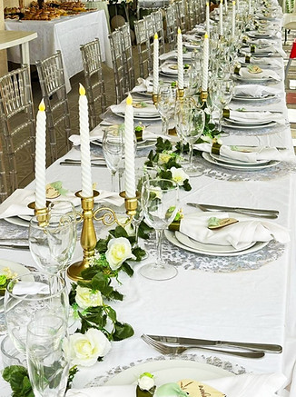 dressed table with a silverware and glassware