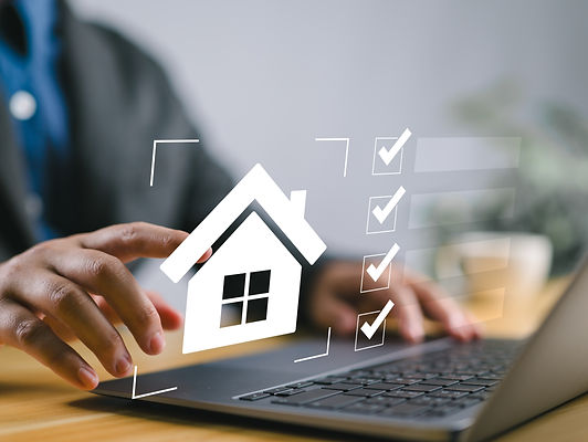 Real estate checklist concept, Businessman organizing real estate tasks on a laptop using