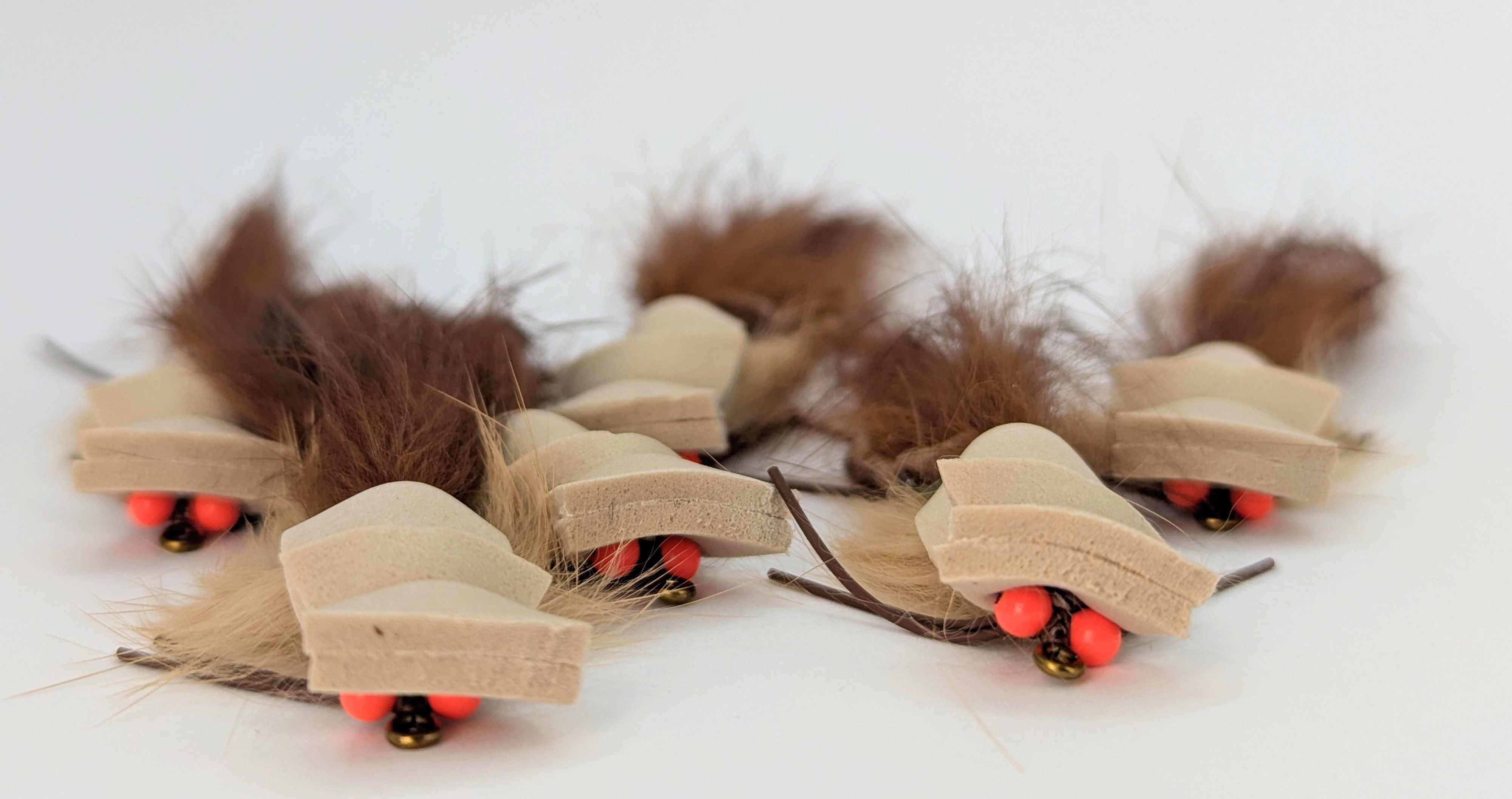 The intricate copper ribbing of a copper john fly.
