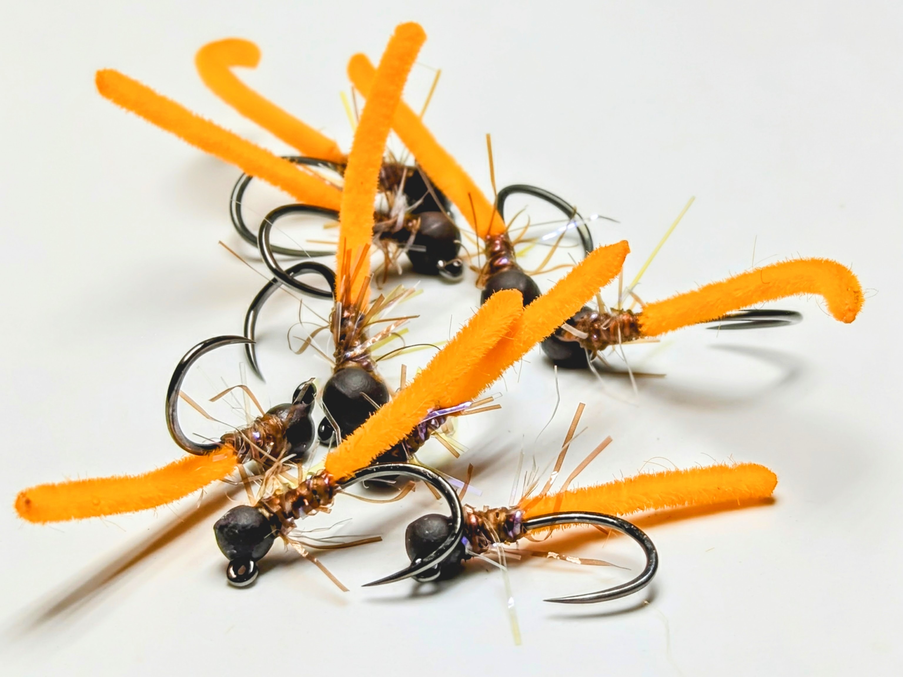The intricate copper ribbing of a copper john fly.