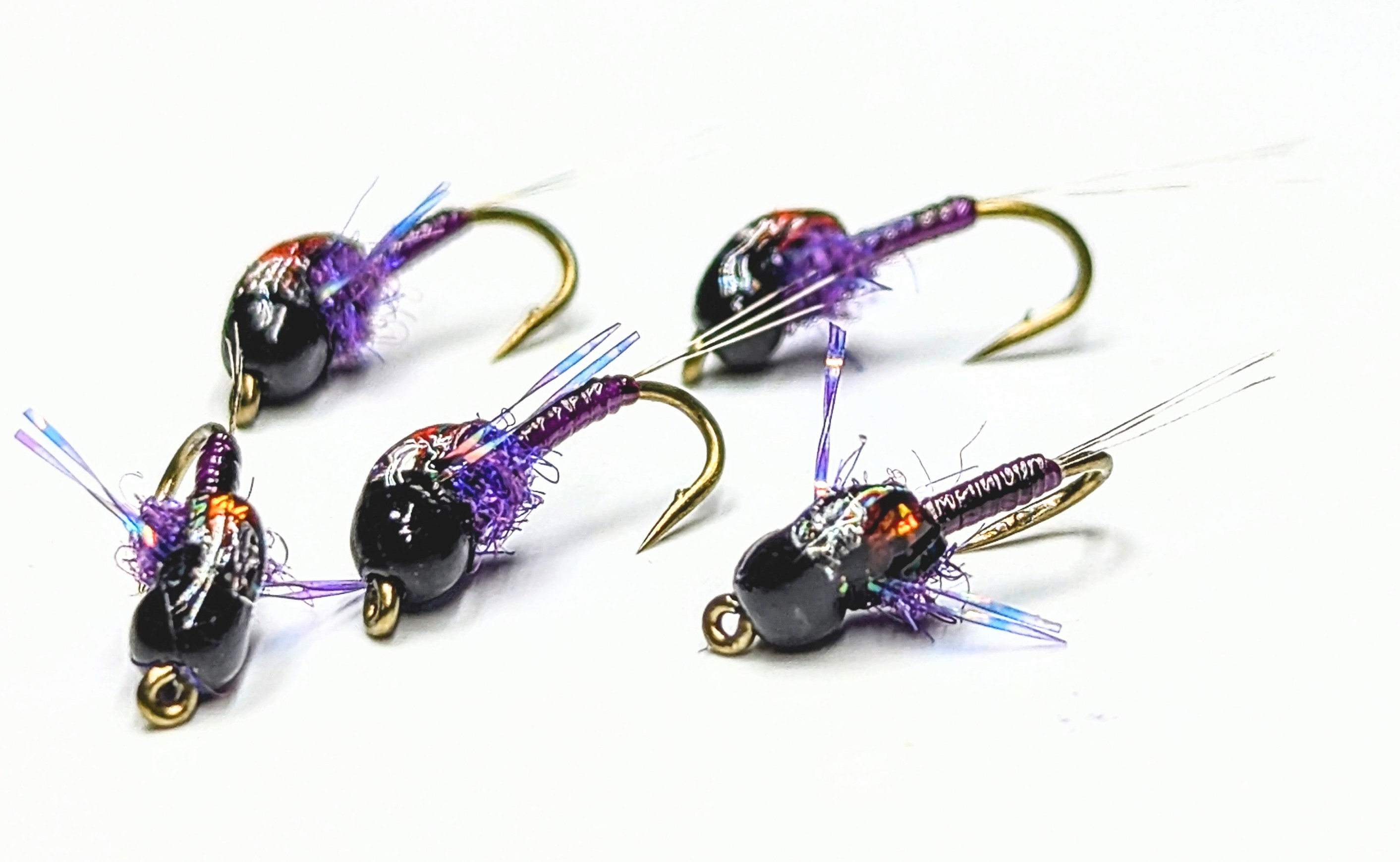 A bead head prince nymph with peacock herl.