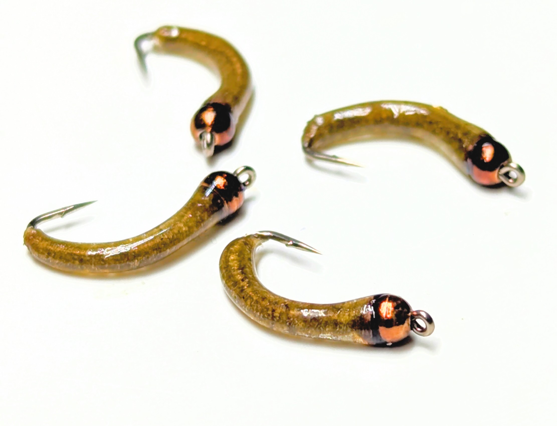 A blue-winged olive dry fly macro shot.