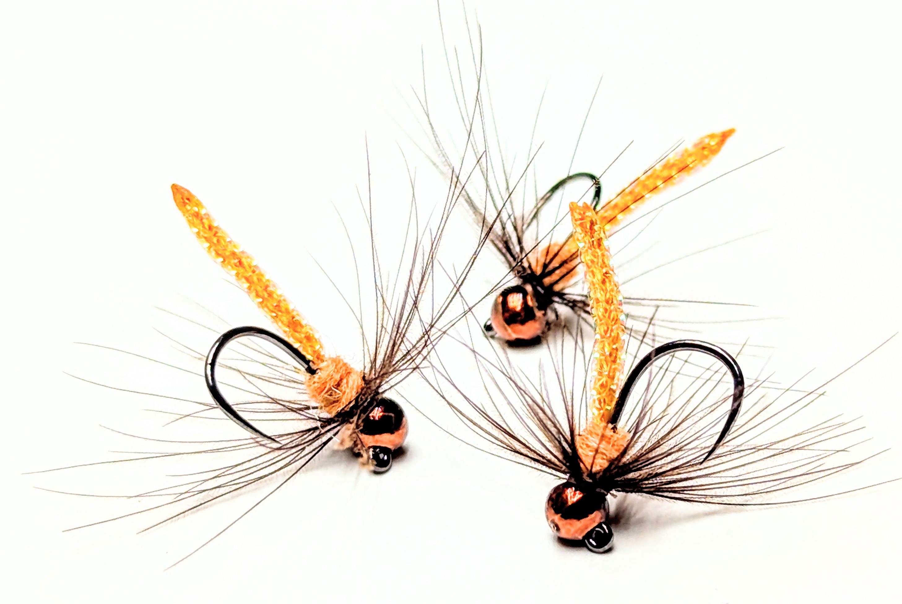 A golden stimulator dry fly for high-visibility fishing.