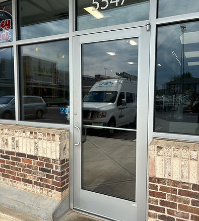 Commercial door glass repair near me