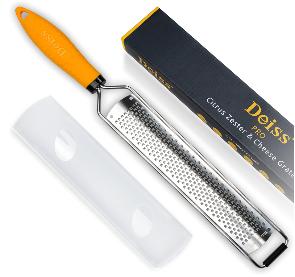 Orange-handled citrus zester and cheese grater with protective cover next to packaging. Black box reads "Deiss PRO Citrus Zester & Cheese Grater."