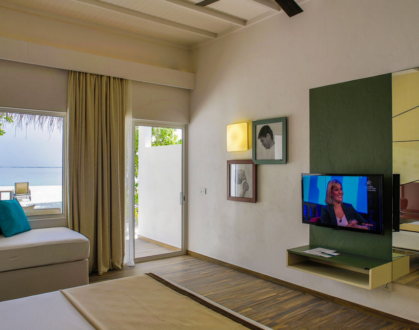 Beach villa at Cocoon Maldives is a room overlooking the Indian Ocean where couples can experience unique moments.