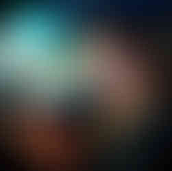 Woman emotionally activated by what she is seeing on her iphone while sitting in her car