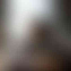 Teenager focused on homework at a desk