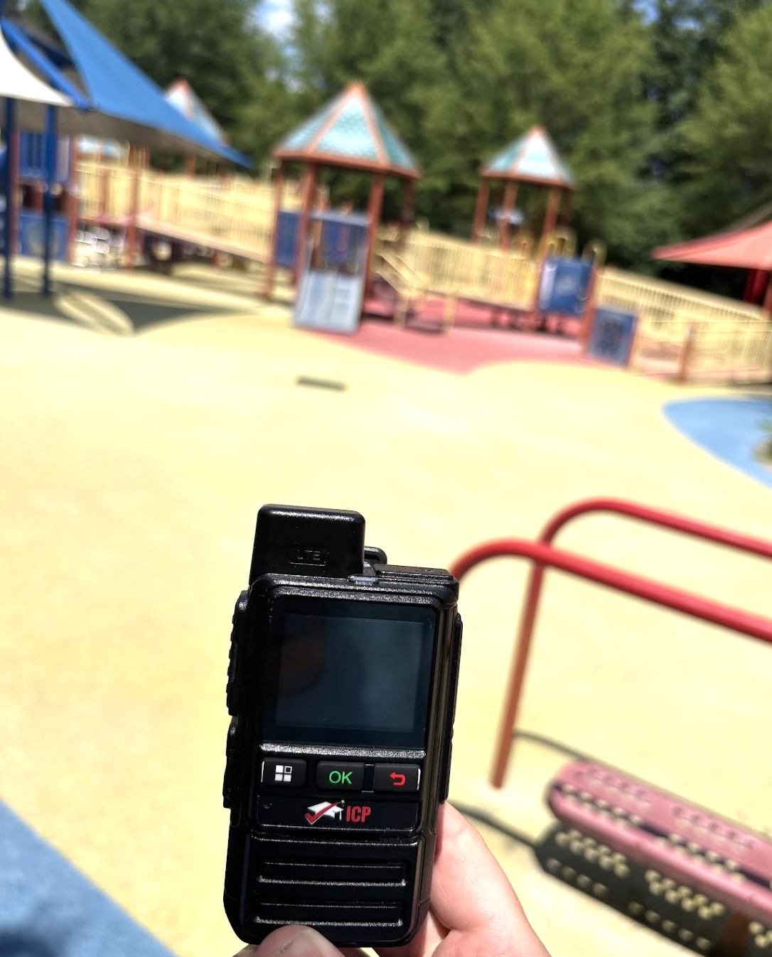 ICP Walkie Talkie outdoors with playground awning
